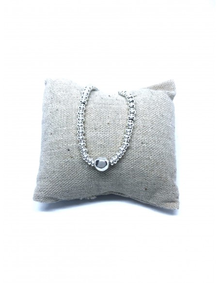 Bracciale con Rondelle e una Pepita Tonda Martellata Bianca