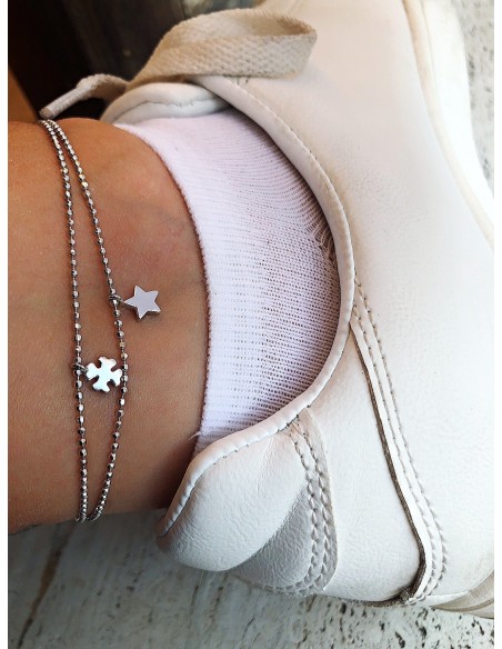 Cavigliera con Soggetti Pendenti