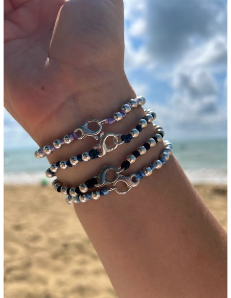 Bracelets Colored Balls and Knots